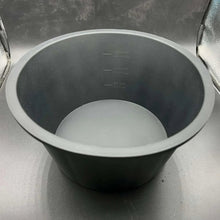 Dark gray silicone slow cooker liner, round bowl insert with measurement marks