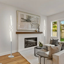 Spiral LED floor lamp with slim white twisted light tube and circular base