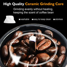 Ceramic grinding core inside a manual coffee grinder with whole coffee beans