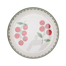 Pink tomato design serving plate with green leaf border and round shallow dish