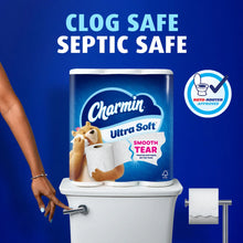 Charmin Ultra Soft toilet paper canister with stacked white rolls