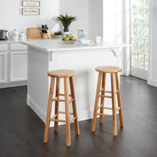 Two natural wood backless bar stools with round seats and ladder-style frames