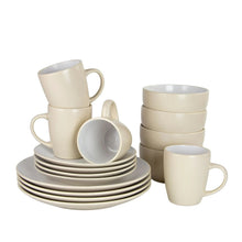 Two-tone coupe dinnerware set with stacked plates, bowls, and tan cups