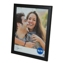 Black tabletop picture frame with 8x10 photo window, angled view