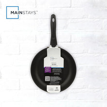 Black non-stick skillet with underside label and long handle