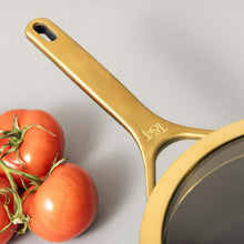 Non-stick saucepan handle in gold-tone with spout-style neck