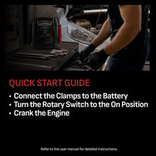 Portable power station in a car engine bay with battery clamps attached