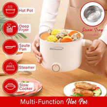 Brentwood hot pot cooker with steamer accessory, steaming vegetables and meat