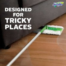 Swiffer sweep-and-mop mop head with white cloth pad reaching under sofa