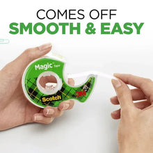 Scotch Magic Tape dispenser roll held in hands with clear tape