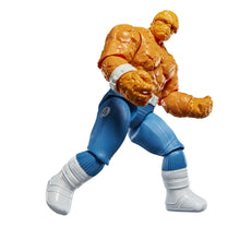 Marvel The Thing action figure, orange rocky arms, blue pants, white boots, bent-leg pose