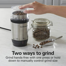 Electric coffee grinder with hopper and glass jar for storing ground coffee