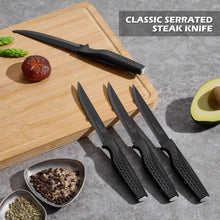 Classic serrated steak knives and other kitchen knives arranged on a board