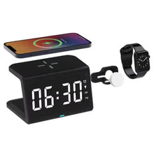 Wireless charging station alarm clock with 06:30 display, phone dock and smartwatch