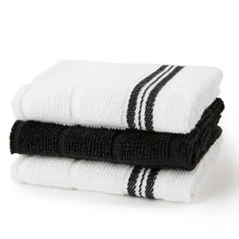 Stack of cotton kitchen towels with white fabric and black striped borders