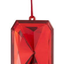 Red faceted gem ornament close-up with red hanging loop