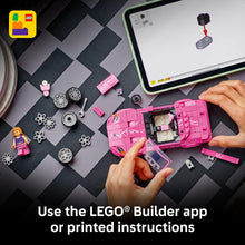 Pink LEGO Speed Champions car build with loose parts and tablet instructions