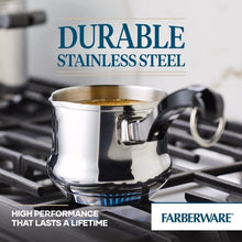 Stainless steel butter warmer pot on stovetop with loop handle