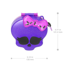 Purple skull-shaped compact with heart-bow clasp and visible size markers