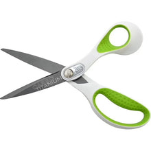 Office scissors with white handles and green finger loops, spread straight blades