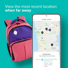 White Bluetooth tracker on a keyring attached to a backpack with a phone map screen
