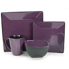 Stoneware dinner set with purple serving platter, bowls, and mugs