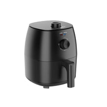Black air fryer with side handle, control knob, and circular power/heating indicator