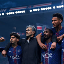 EA SPORTS FC 26 PS5 game: players in blue jerseys posing together on the pitch
