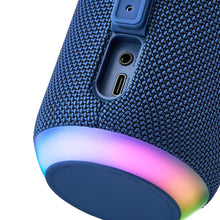 Navy speaker side ports with USB-C and 3.5mm, plus rainbow LED light