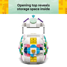 LEGO decorative Easter egg building toy, front view with top opening and interior storage space