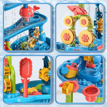 Kids dinosaur sand and water table close-up with red dolphin and blue water channels