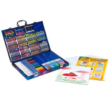 Crayola imagination art coloring set open case with crayons, colored pencils, and paper sheets