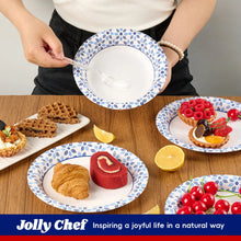 Printed paper bowls with blue floral pattern, one held up over table desserts