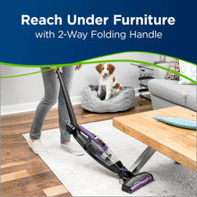 Purple cordless stick vacuum with 2-way folding handle for reaching under furniture