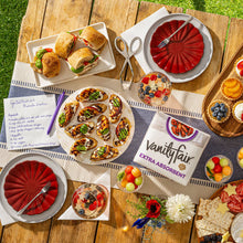 Vanity Fair white paper napkin package on a table set for a meal