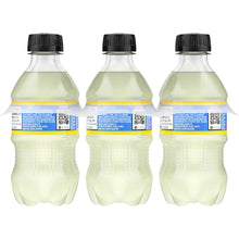 Back label view of three Minute Maid lemonade bottles, black caps, pale yellow liquid.