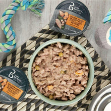 Pure Balance grain-free wet dog food bowl with chicken dinner in gravy cups