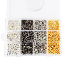 Metallic spacer bead assortment, clear case showing silver and gold bead compartments