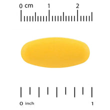 Yellow SAMe tablet with inch and cm ruler scale markings