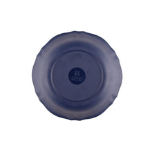 Cereal bowl underside with stamped logo, dark navy round base