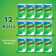 Pack of 12 paper towel rolls displayed on shelves, Bounty green branding