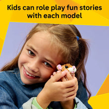 Child holding a small LEGO hamster model with pink ears and a purple flower