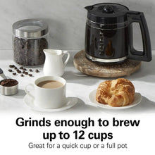 Electric coffee grinder with clear top and dark lid, white body