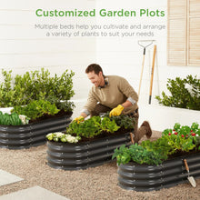 Charcoal oval raised garden beds planter set arranged for multiple plants outdoors