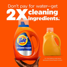 Tide Ultra Hygienic Clean detergent bottle with second jug and orange background