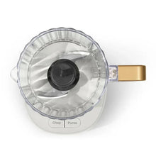 White 3-cup food chopper with clear bowl and black blade base, top view