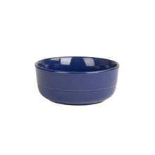 Blue stoneware cereal bowl with curved sides and glossy glaze