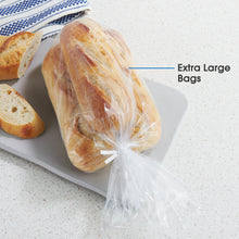 Extra large twist tie storage bag on a tray, filled with a bread loaf