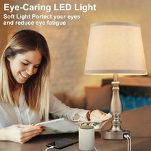 Table lamp with white linen shade and metal base, soft eye-care lighting