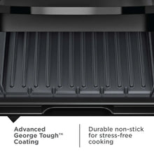 Black nonstick grill plate with ridged grooves and drip channels